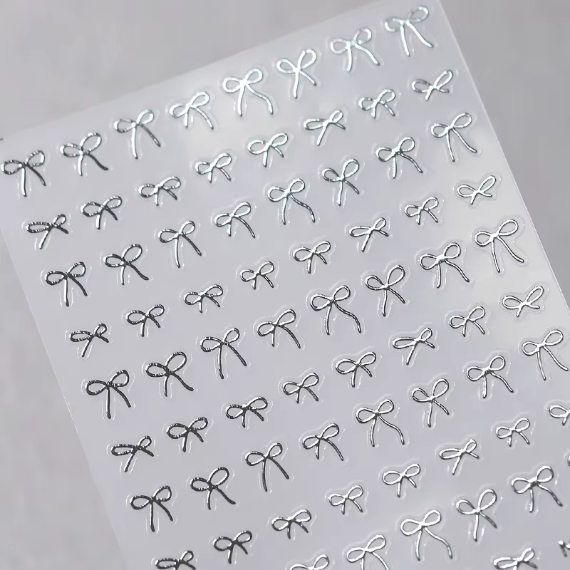 Autocollants 3D Adorables Dorés Argentés Blancs à Nœuds Papillon pour Ongles, Rubans Adhésifs Mignon
