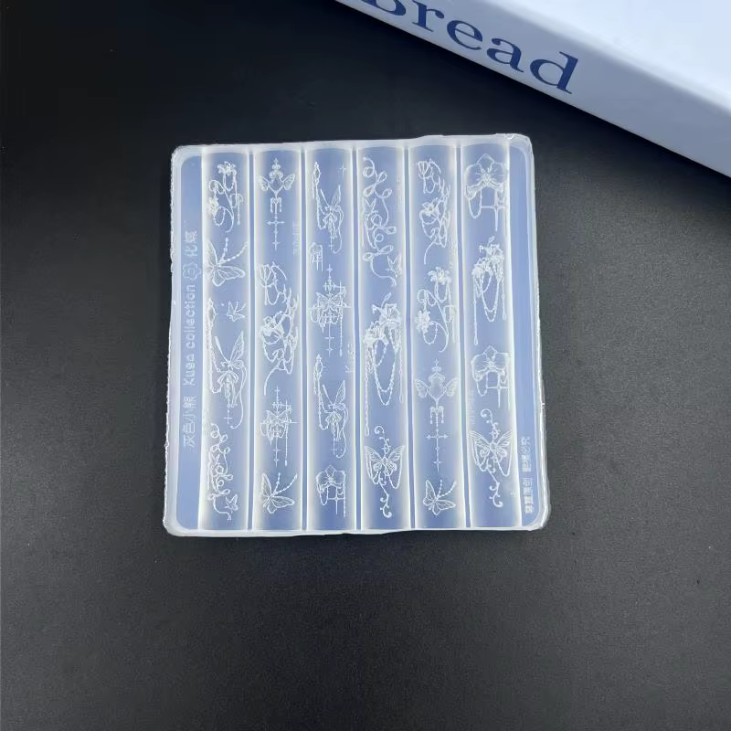 Moule en silicone pour nail art avec motifs vintage baroques, nœuds et papillons pour créations de m