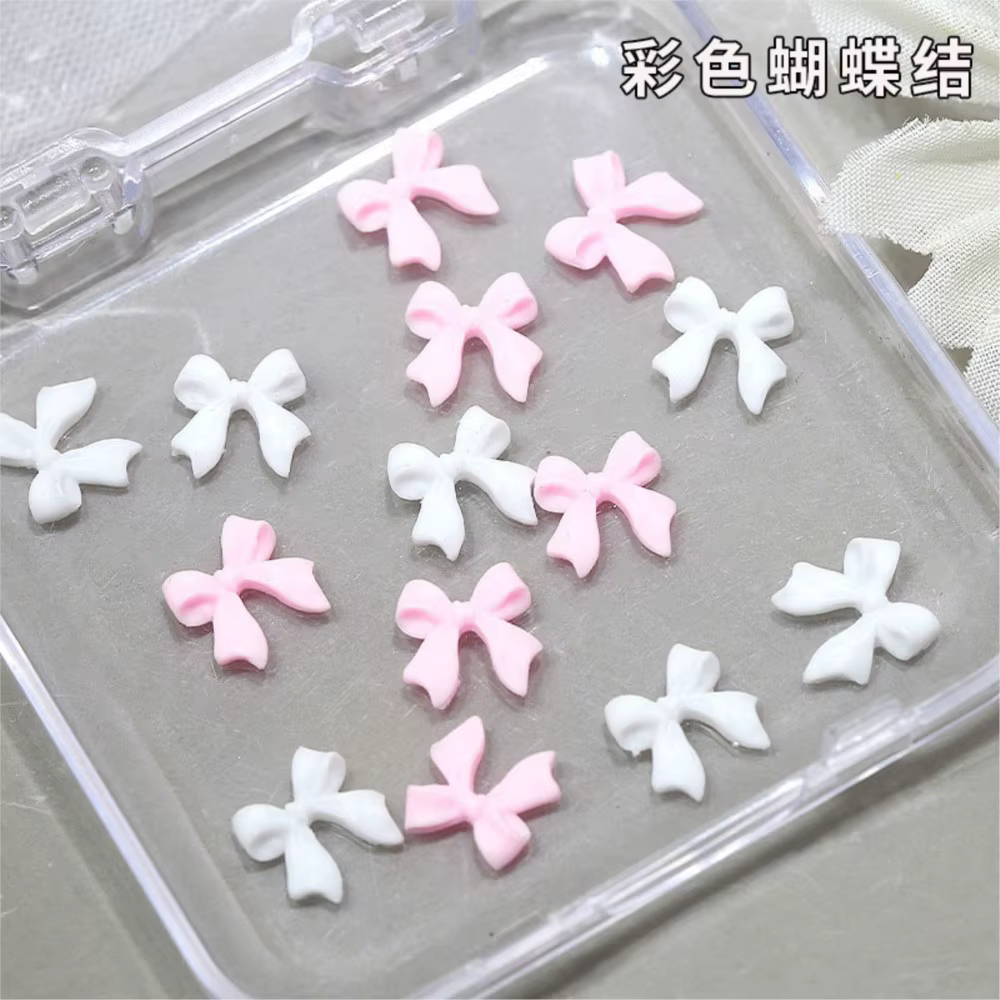 30 pièces/boîte 3D blanc et rose arcs Nail Art breloques 6gird mignon nœuds papillon ruban ongles st