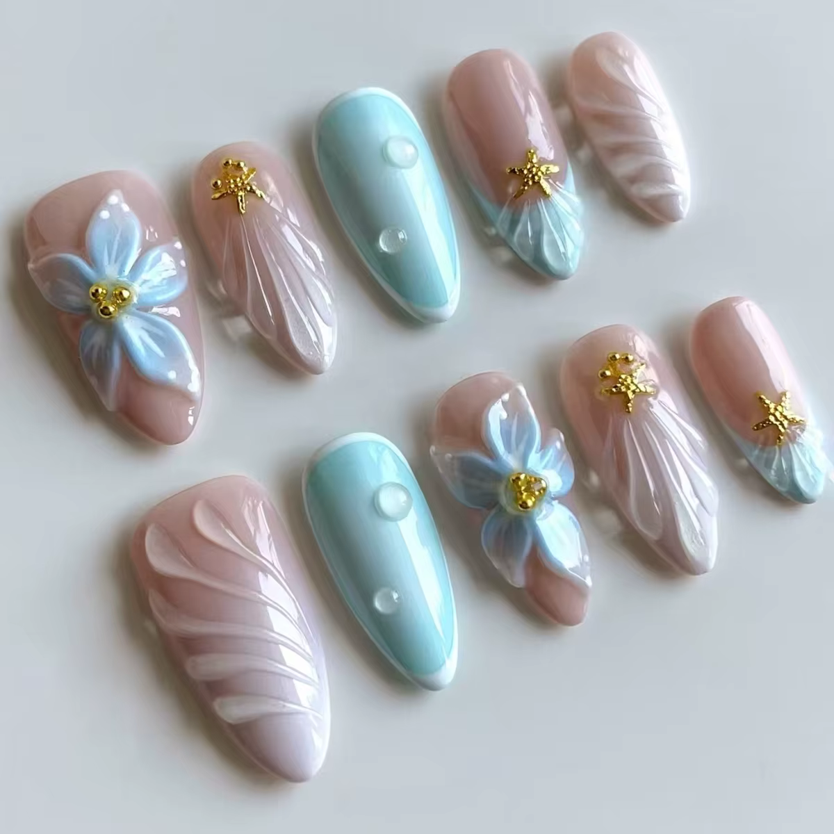 Faux ongles ovales mi-longs à pression en amande bleue, 24 pièces, avec perles 3D, pointes à motif d