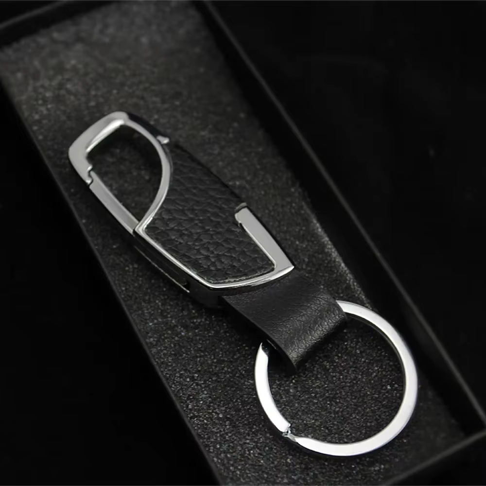 Porte-clés créatif en cuir avec design portable à accrocher à la ceinture, idéal pour les cadeaux so