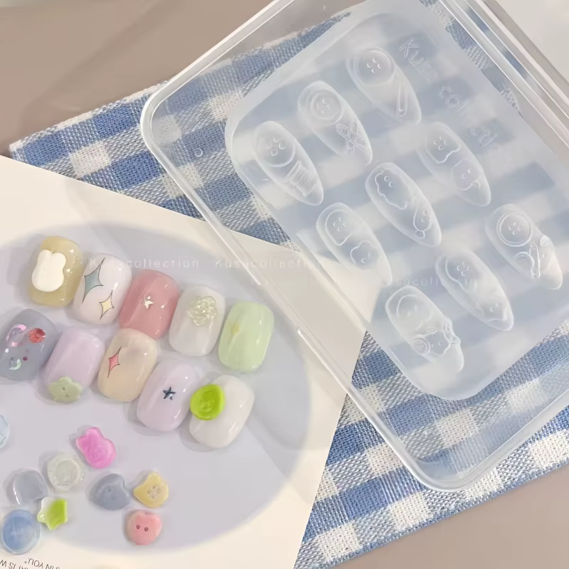 Un moule à ongles de dessin animé, porte-clés, serrure d'amour, bouton étoile, bouton de forme irrég