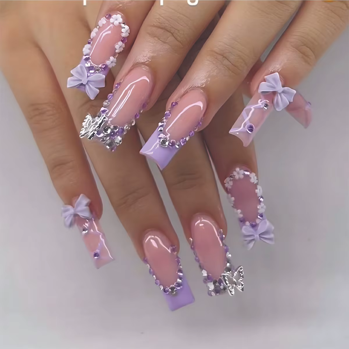 24 faux ongles nude roses avec nœuds 3D et fleurs, à presser, nouvelle collection 2026, style frança