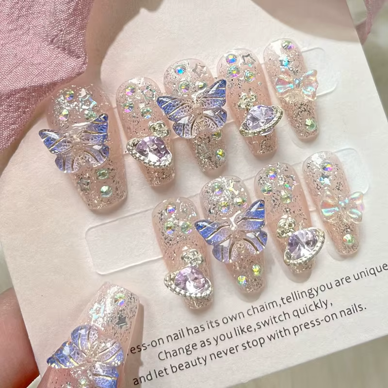 10 pièces presse à la main sur les ongles grand planète conçu faux ongles avec papillon Art paillett