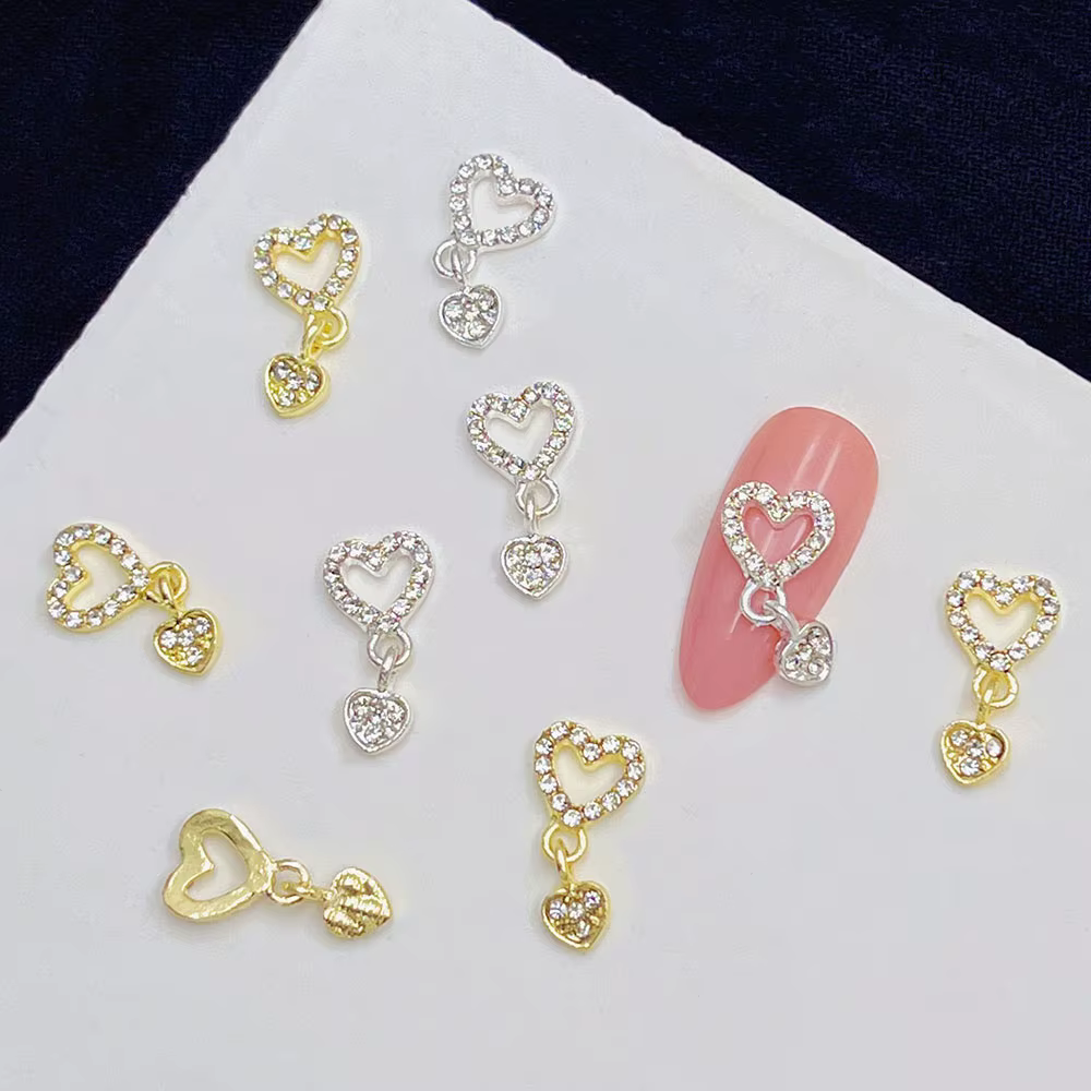 10 pièces coeur balancent ongles breloques 3D alliage luxe ongles strass argent or creux coeur ongle