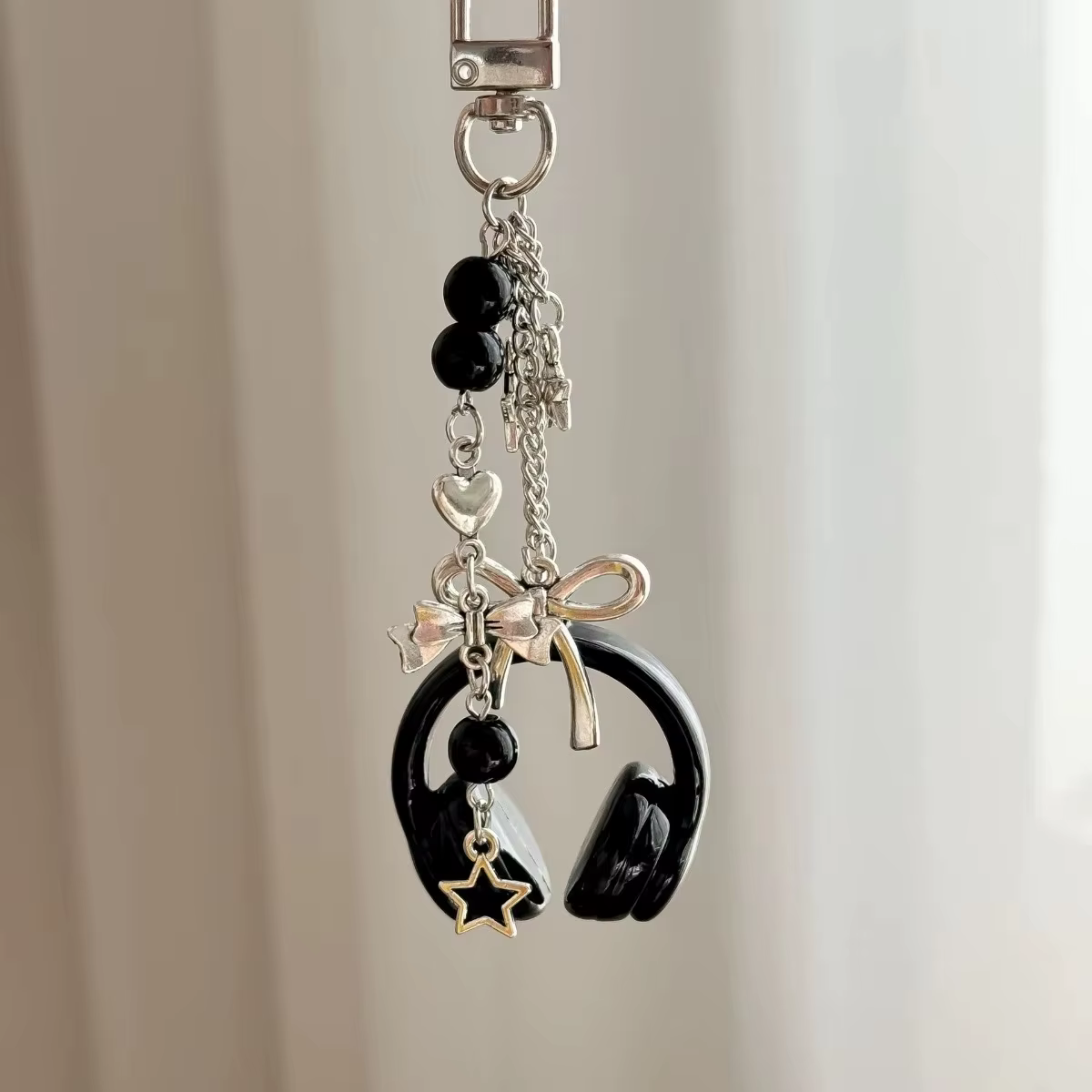 Breloques de sac pour écouteurs de musique haut de gamme, porte-clés unisexe, sangle de téléphone, c
