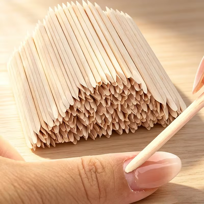 Bâtonnets en bois pour ongles