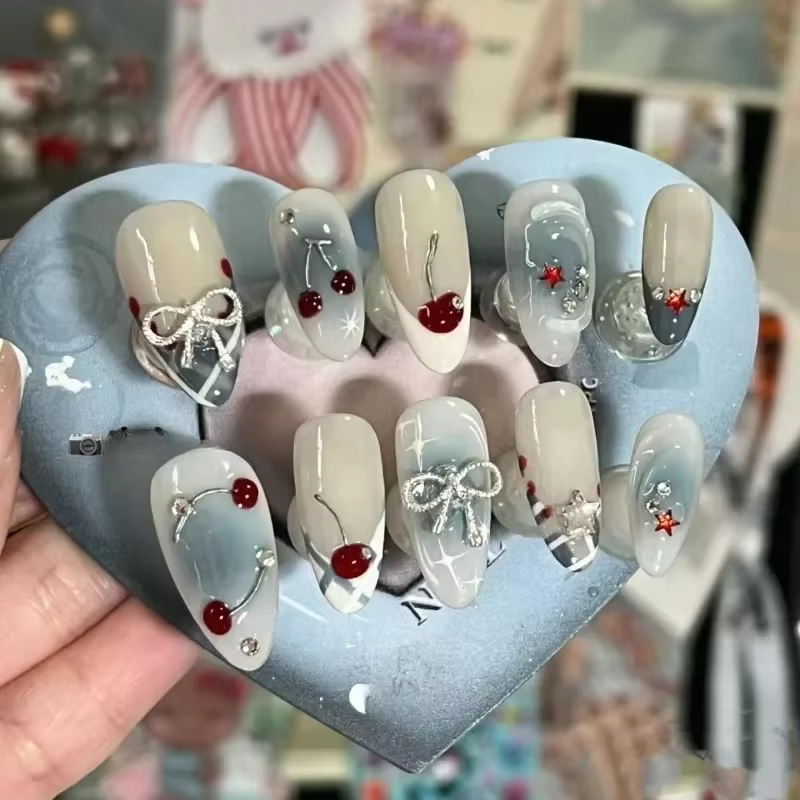 10 pièces presse à la main sur les ongles français amande couverture complète cerises et nœud conception faux