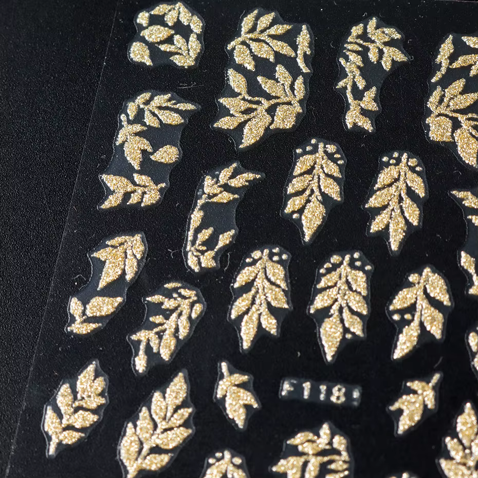 Autocollants pour ongles en forme de feuilles dorées scintillantes