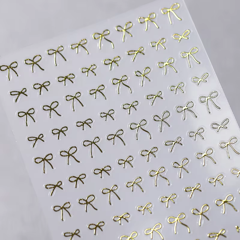 Autocollants 3D Adorables Dorés Argentés Blancs à Nœuds Papillon pour Ongles