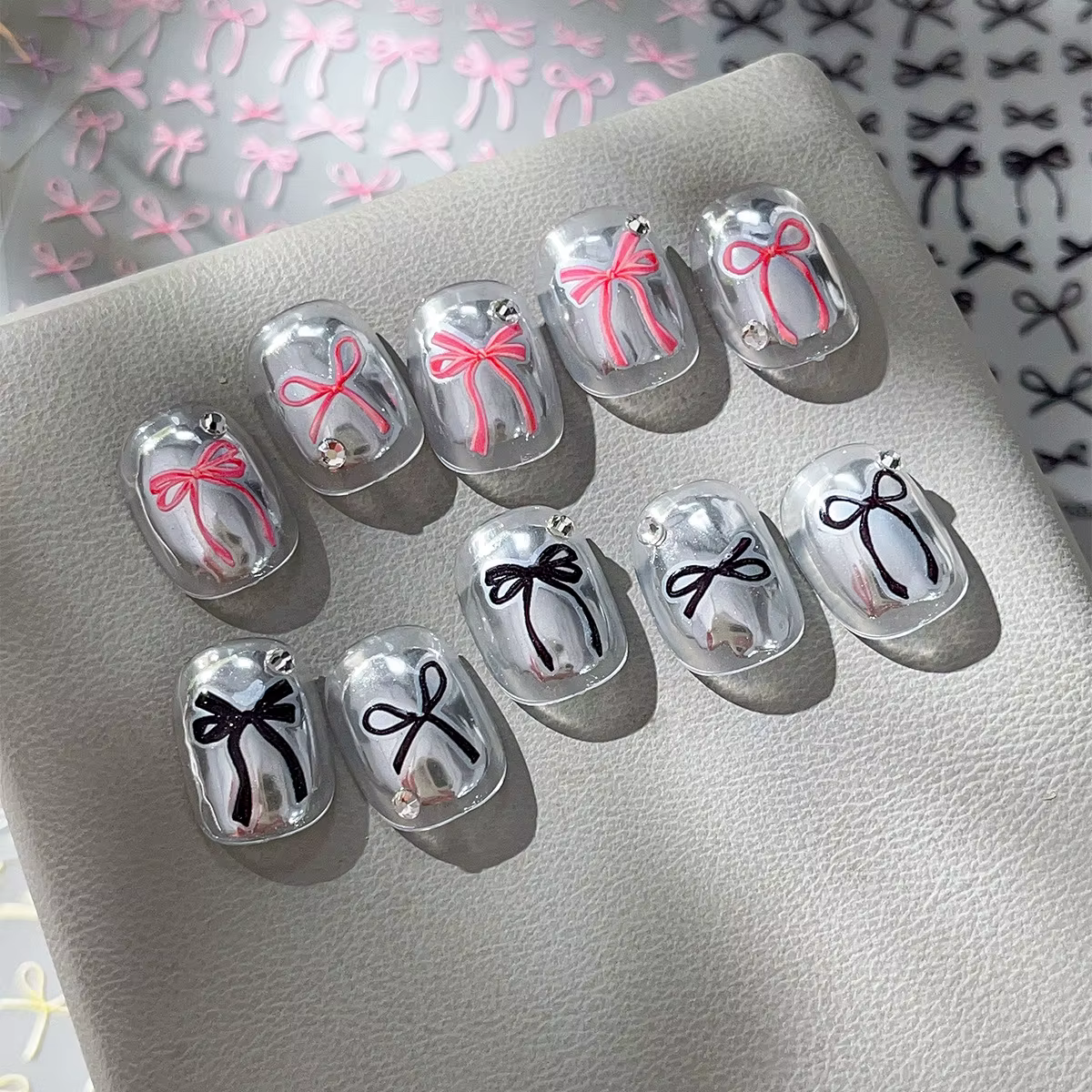 Autocollants pour ongles avec nœud papillon en relief