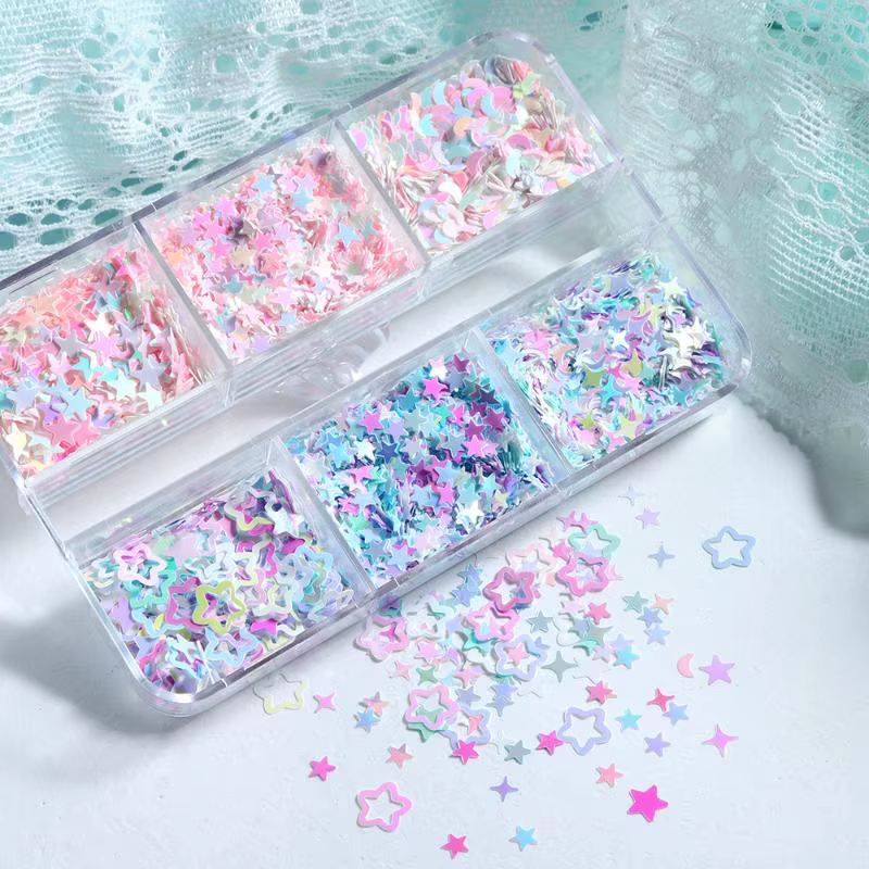 Accessoires pour nail art : étoiles irisées