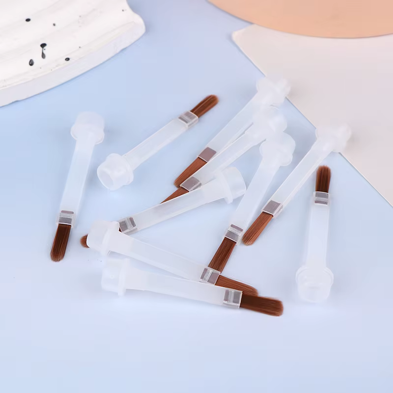 Brosse à vernis à ongles jetable