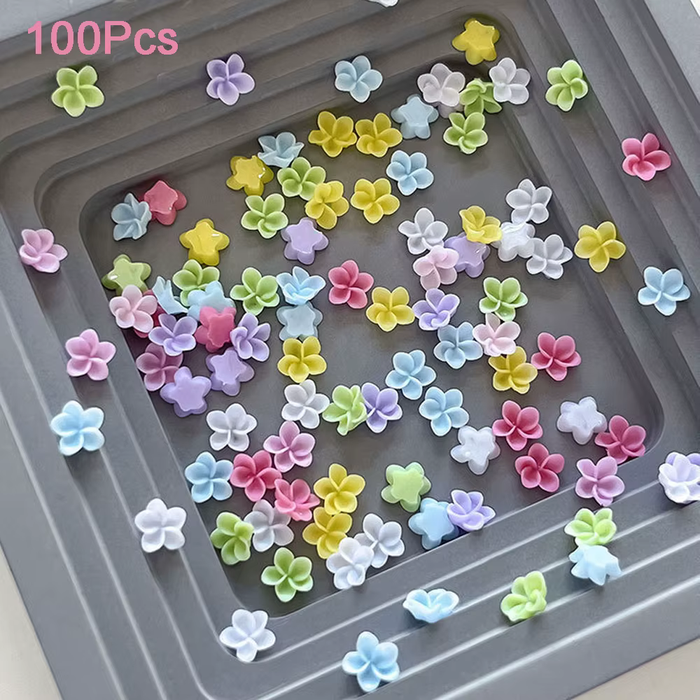 100 pièces de fleurs en résine colorées (frangipanier