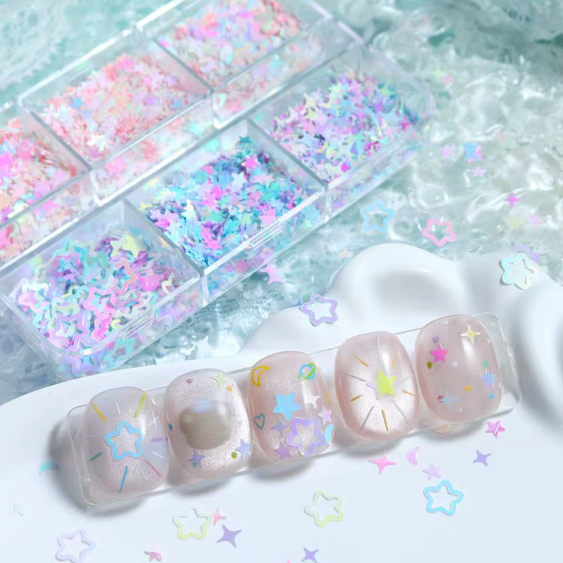 Accessoires pour nail art : étoiles irisées