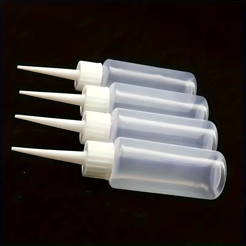 Lot de 4 flacons souples anti-fuite avec embouts de précision