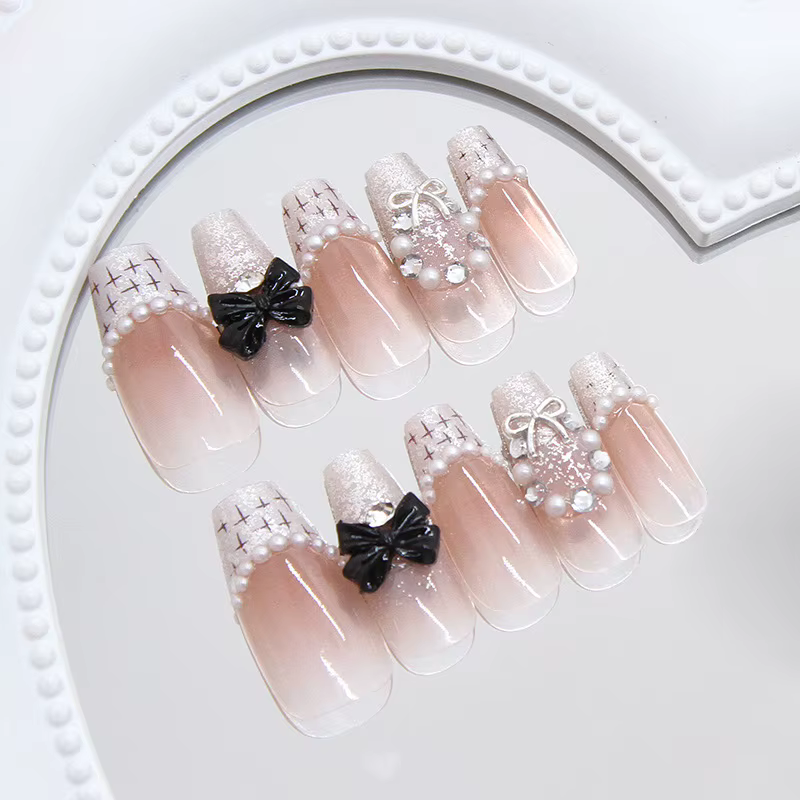 Faux ongles à presser tissés