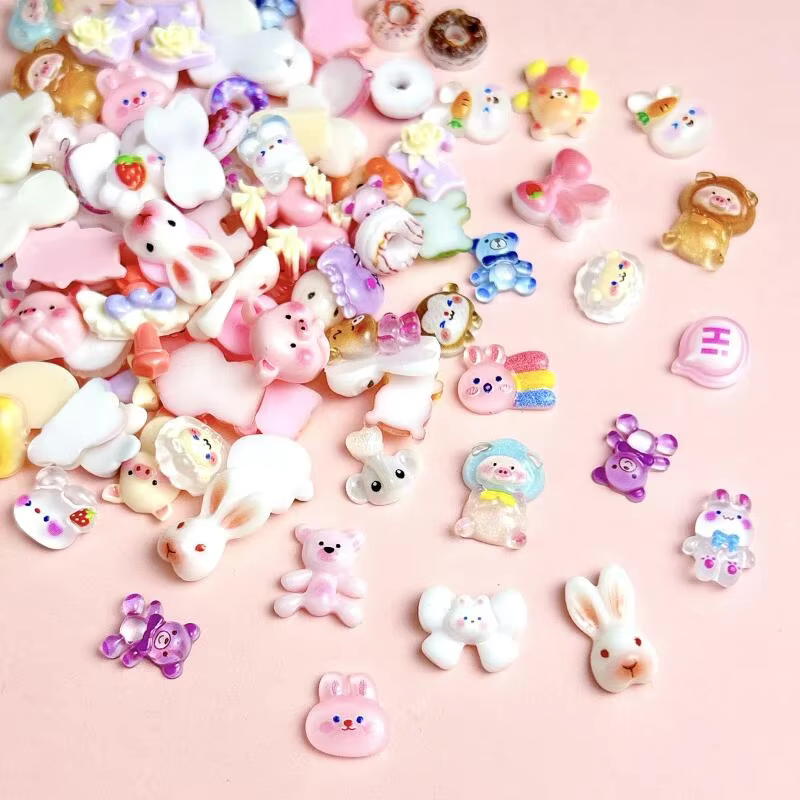 Décorations d'art d'ongle mélangées de série animale de résine de bande dessinée