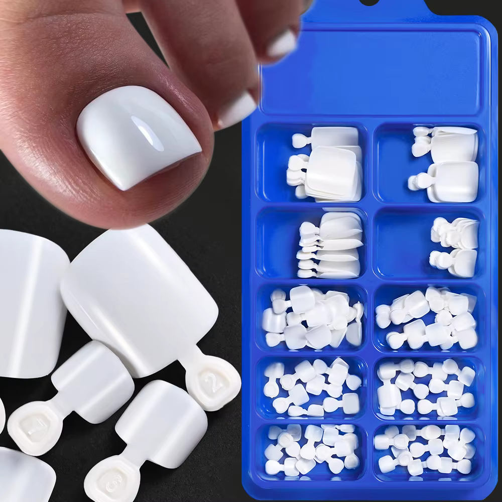 100 faux ongles de pieds naturels blancs à presser