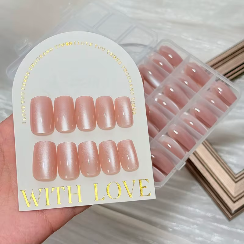 144 faux ongles à presser effet œil de chat rose nude