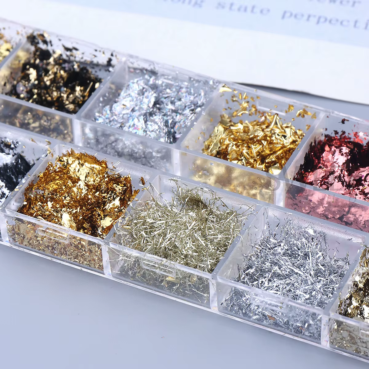12 grilles magnifiques feuilles d'or scintillantes pour Nail Art