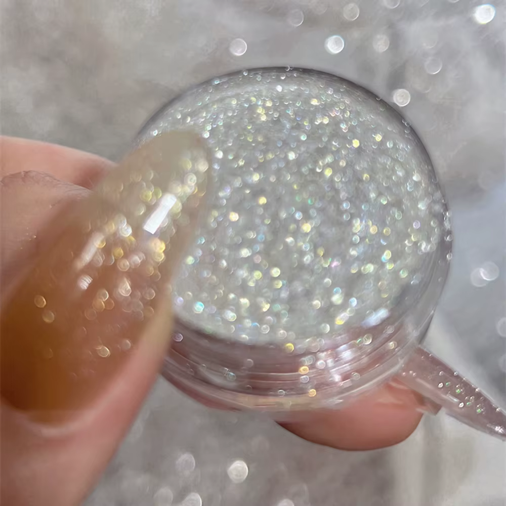 Poudre à paillettes rose scintillante pour ongles