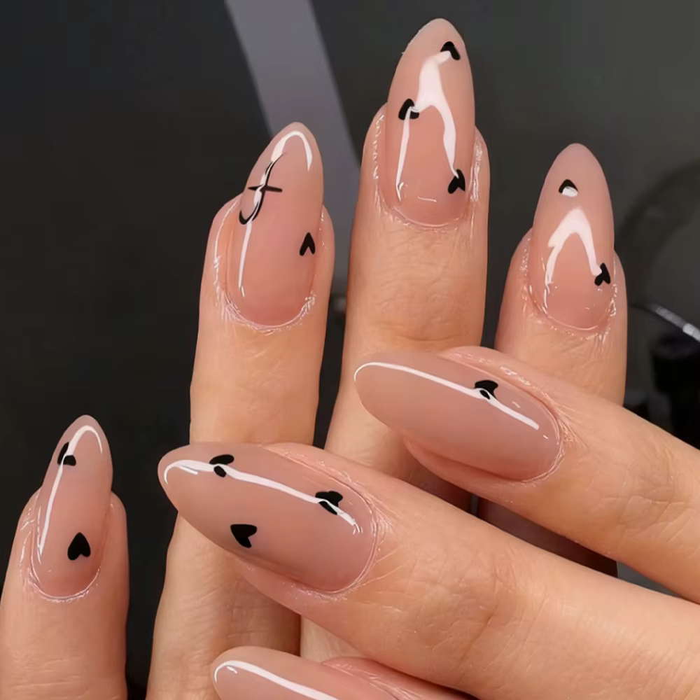 Faux ongles en amande rose clair pour filles
