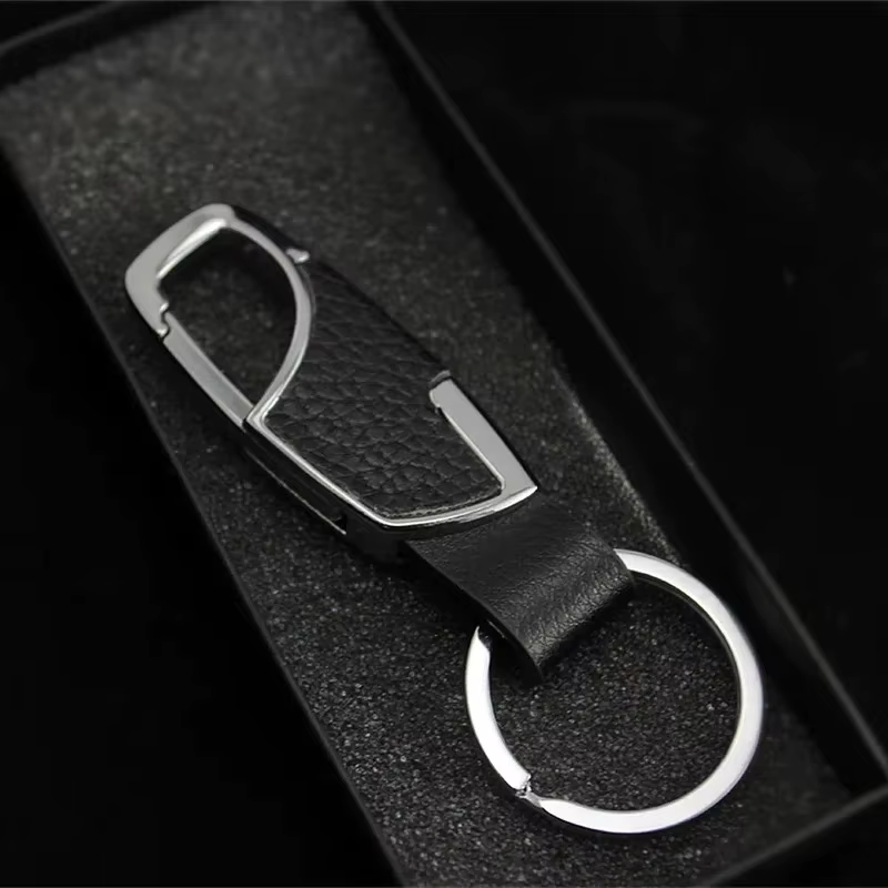 Porte-clés créatif en cuir avec design portable à accrocher à la ceinture, idéal pour les cadeaux souvenirs de vacances