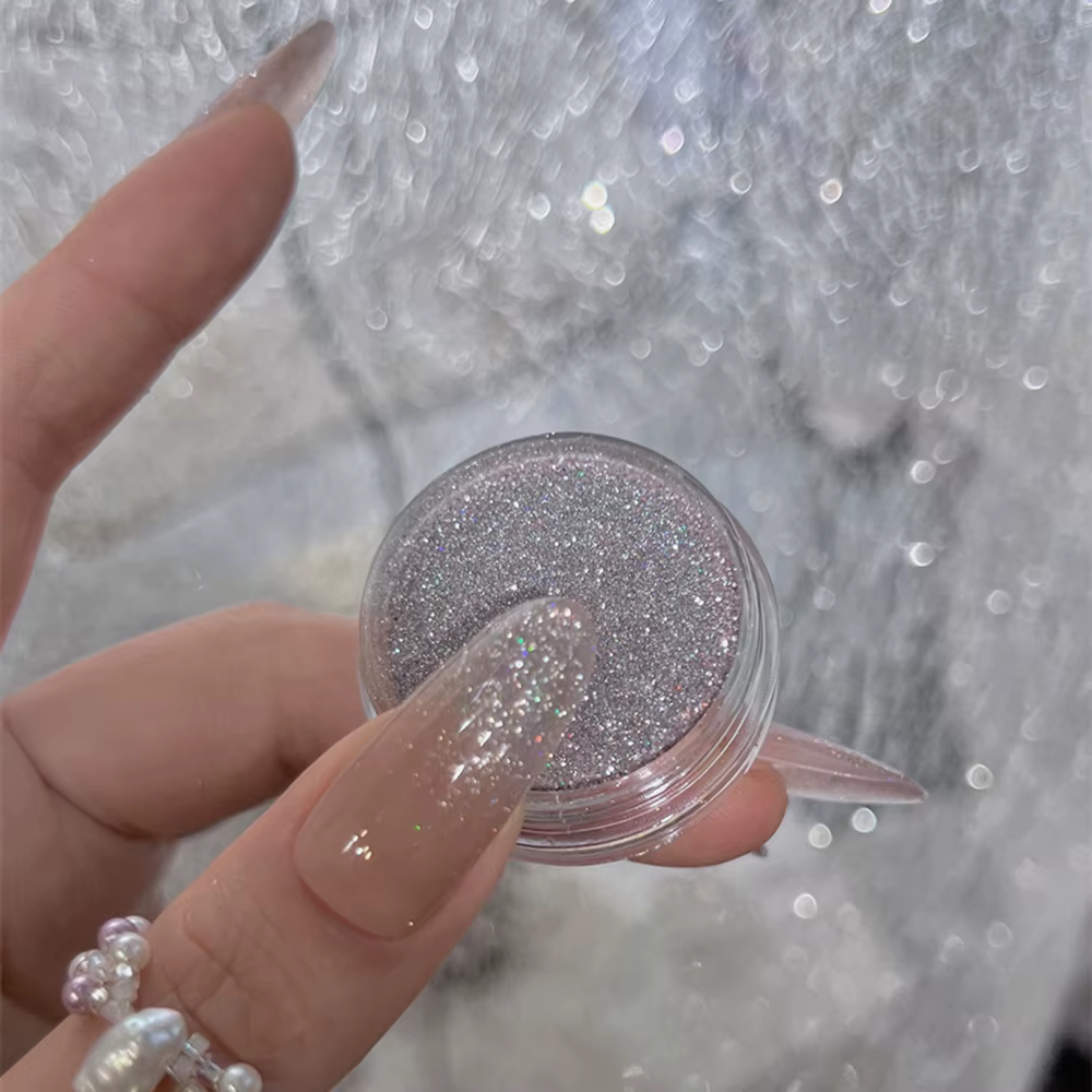 Poudre à paillettes rose scintillante pour ongles