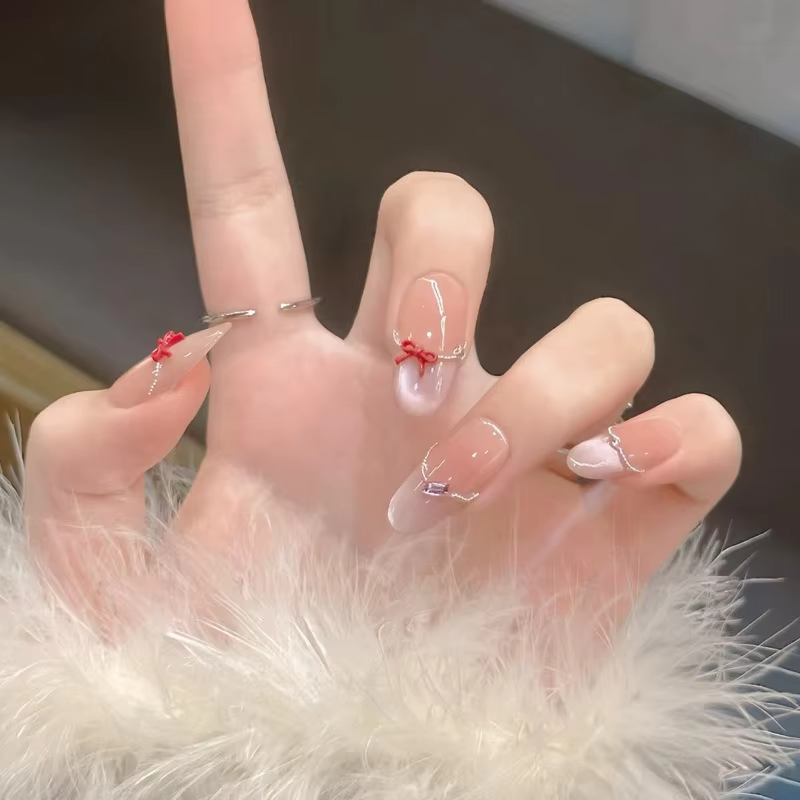 24 faux ongles nude effet œil de chat avec motifs