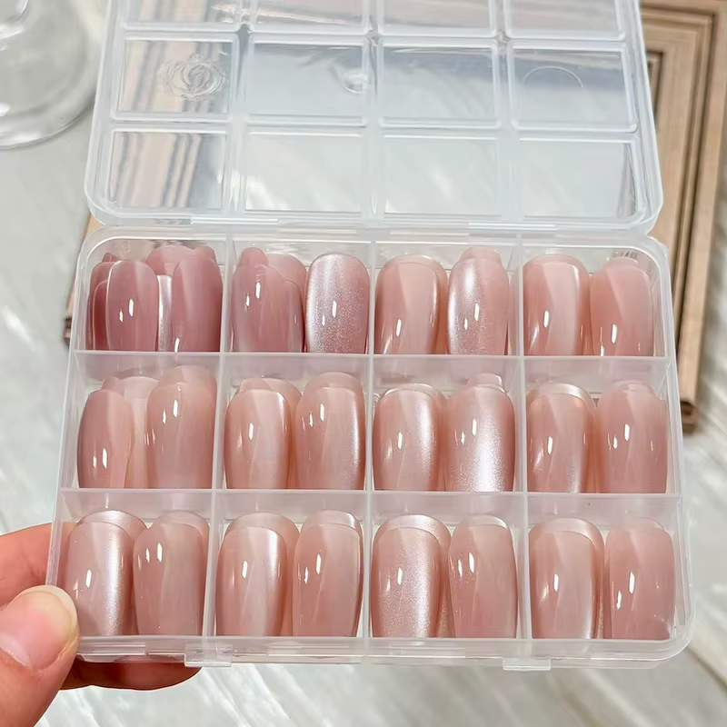 144 faux ongles à presser effet œil de chat rose nude