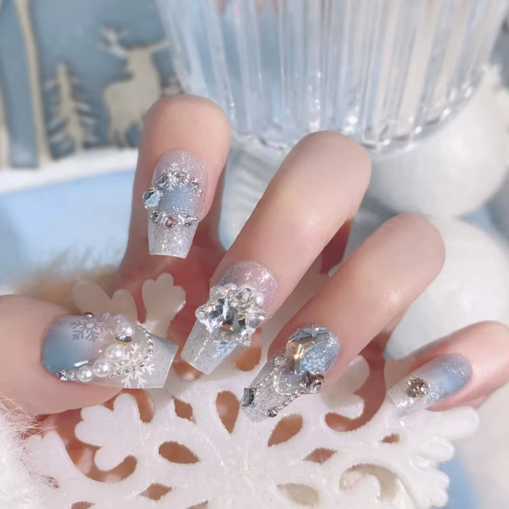 Faux ongles rose poudré avec nœud