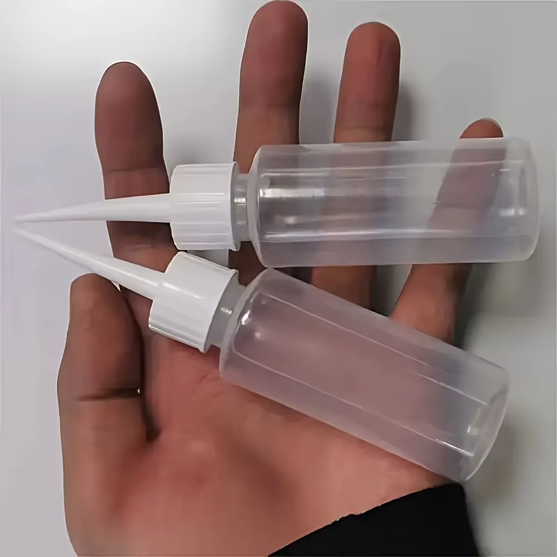 Lot de 4 flacons souples anti-fuite avec embouts de précision