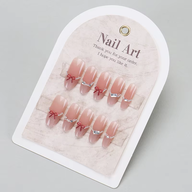 24 faux ongles nude effet œil de chat avec motifs