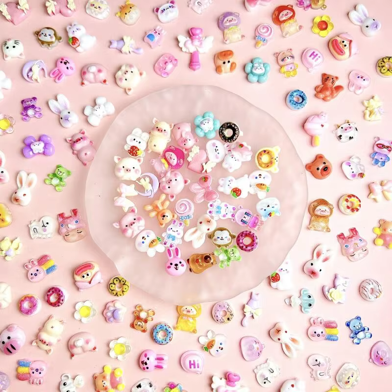 Décorations d'art d'ongle mélangées de série animale de résine de bande dessinée