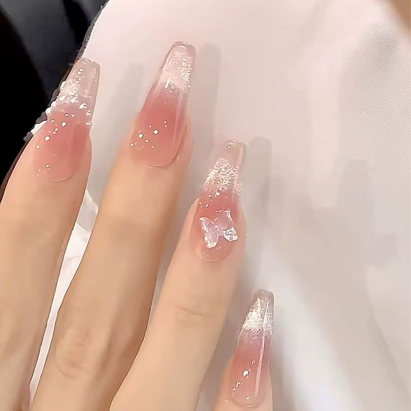 10 pièces de faux ongles à presser papillon rose