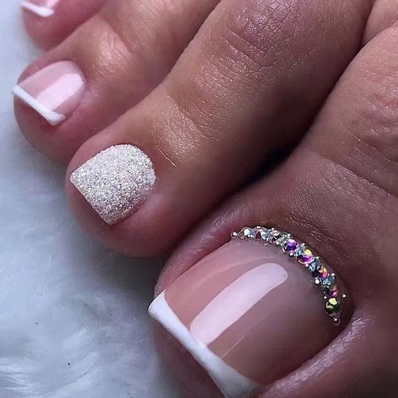 Faux orteils pailletés rose doux
