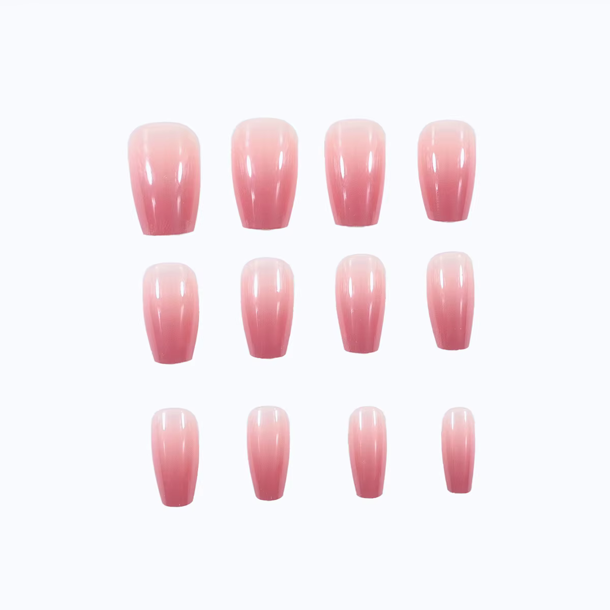 Un ensemble complet de 24 faux ongles moyens en forme de cercueil avec un design dégradé pêche