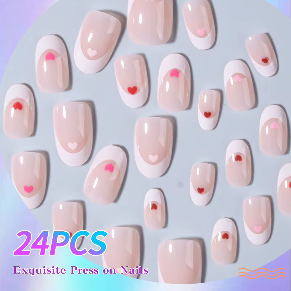 24 pièces par ensemble. Ongles courts ovales blancs en forme de cœur