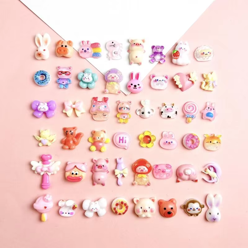 Décorations d'art d'ongle mélangées de série animale de résine de bande dessinée