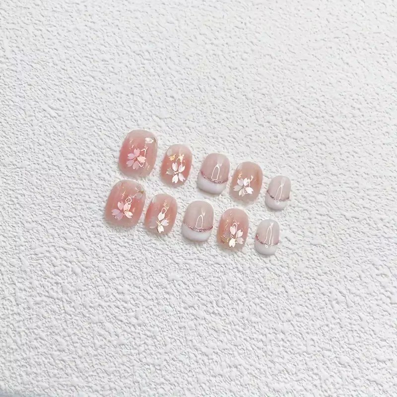 Faux ongles rose doux faits à la main pour femmes et filles
