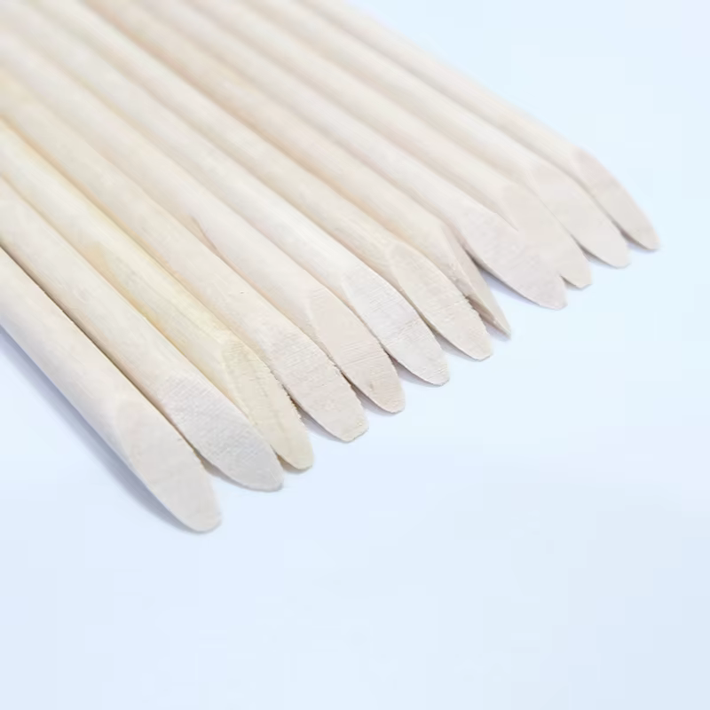 Bâtonnets en bois d'oranger pour repousser les cuticules
