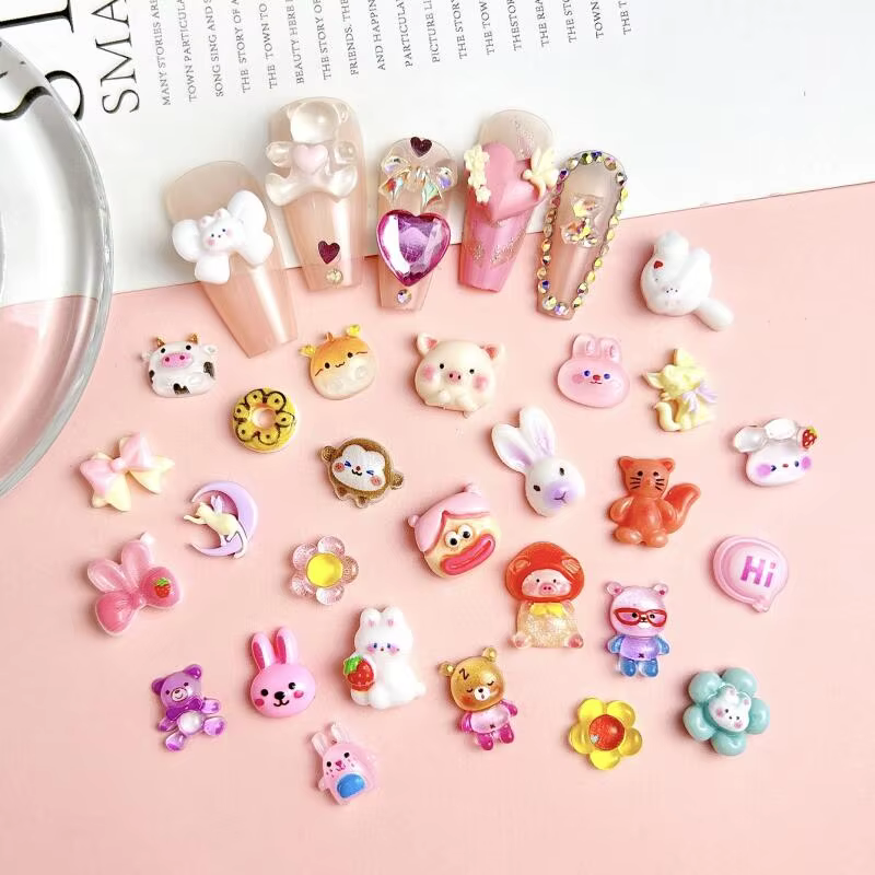 Décorations d'art d'ongle mélangées de série animale de résine de bande dessinée