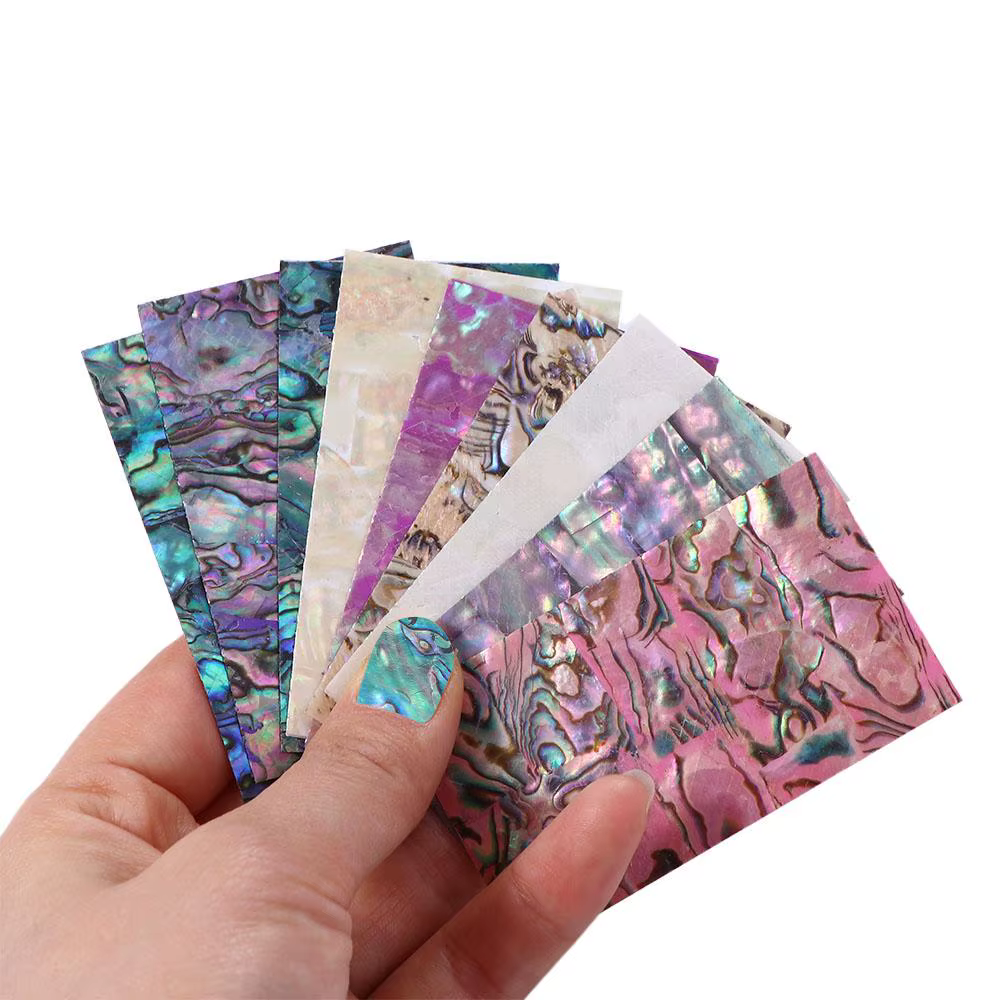 Feuilles autocollantes colorées pour les ongles