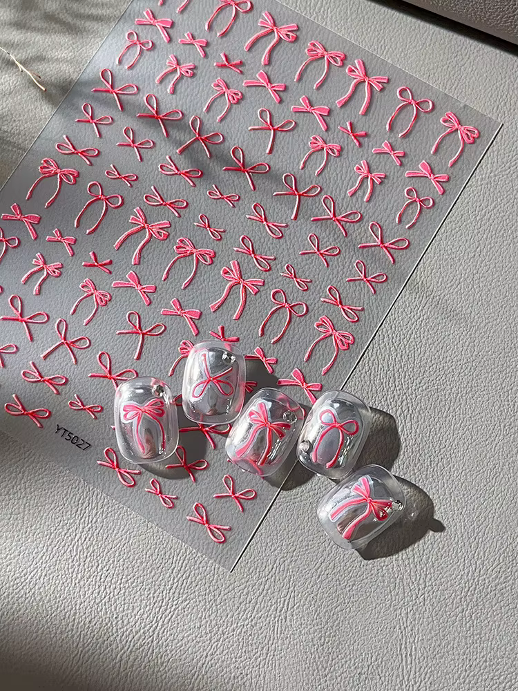 Autocollants pour ongles avec nœud papillon en relief