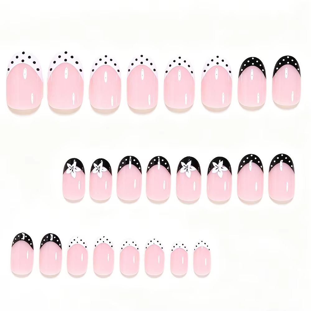 Ongles pressés simples noir et blanc avec fleurs blanches et pois noirs et blancs. 24 faux