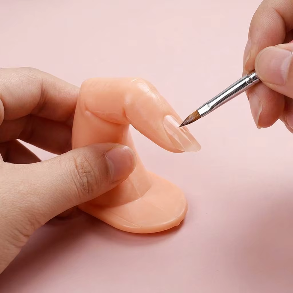 Doigt d'entraînement en plastique pour manucure
