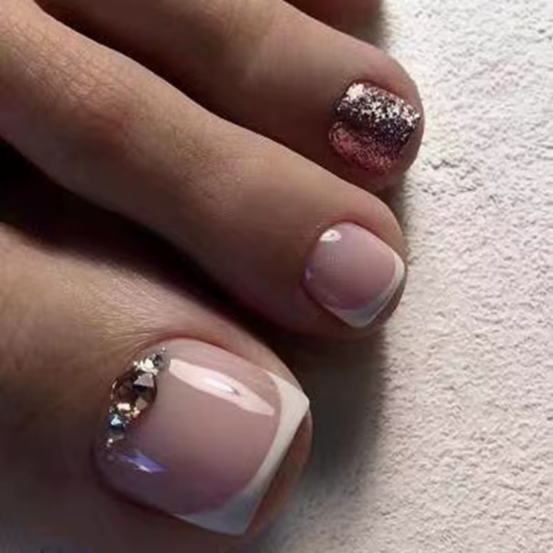 Faux orteils pailletés rose doux