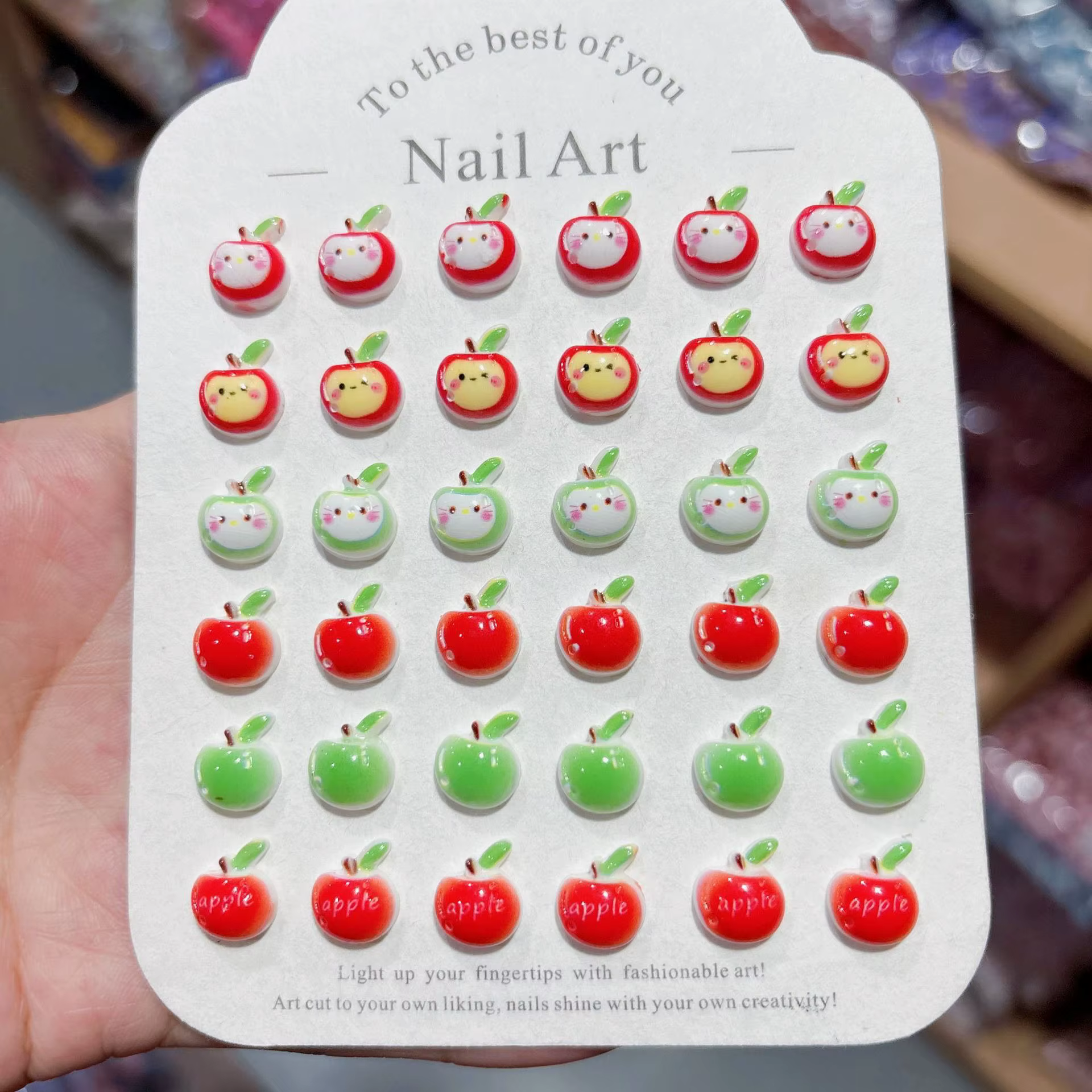 100 pièces/paquet de breloques pour ongles en forme de pomme de dessin animé 9×12mm - Décorations d'ongles en résine