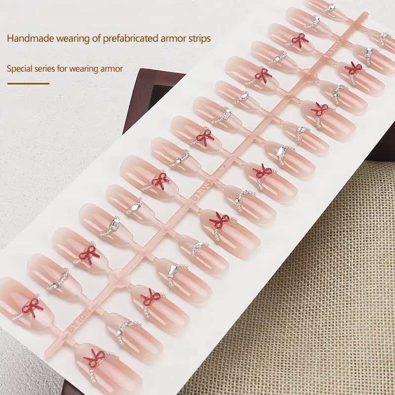 24 faux ongles nude effet œil de chat avec motifs